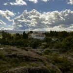 a view of a house from a hill